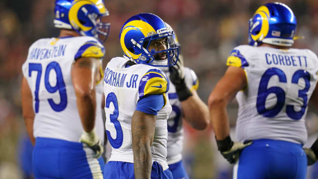 Odell Beckham Jr. looks back toward the sideline as the Rams form a huddle